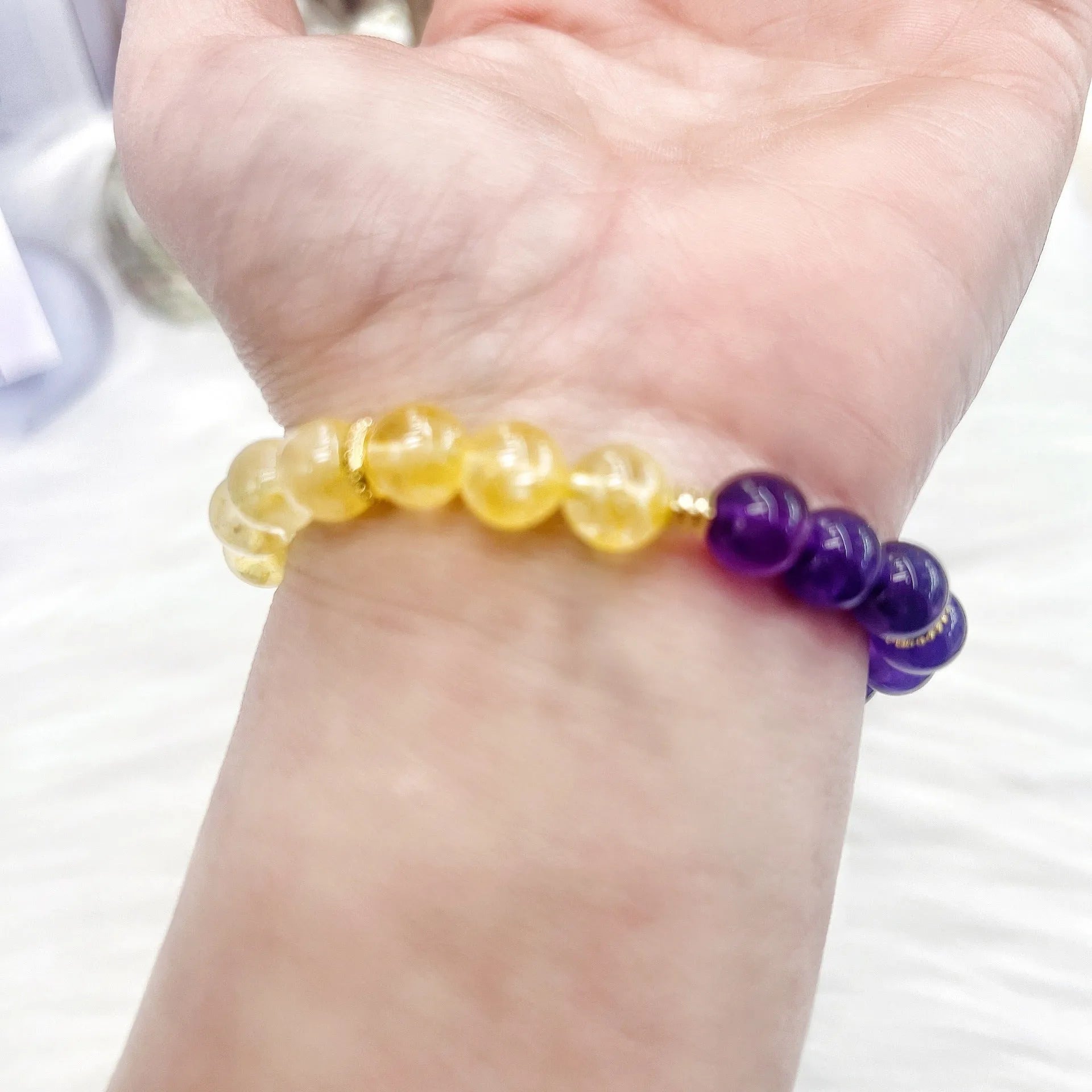 Handmade women's crystal bracelet in yellow and purple colours
