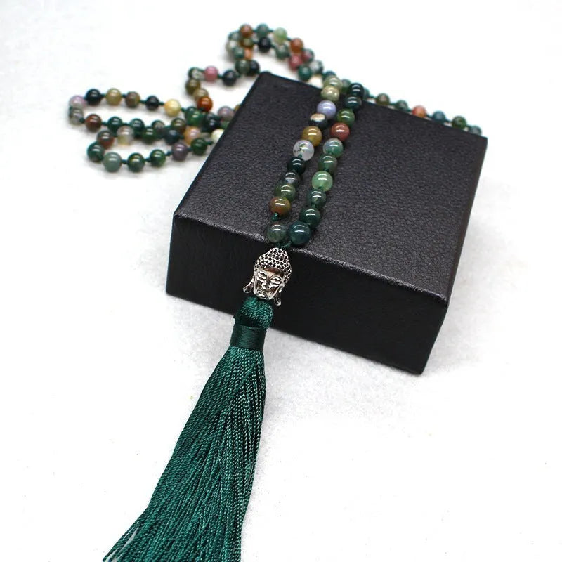 Natural agate bracelet with 108 geometric beads, each measuring 6mm, laid flat.