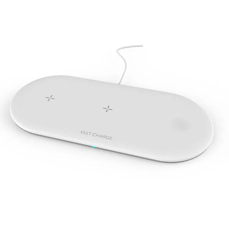 White three-in-one wireless charging station for Apple iPhone, watch, and headphones on a desk.
