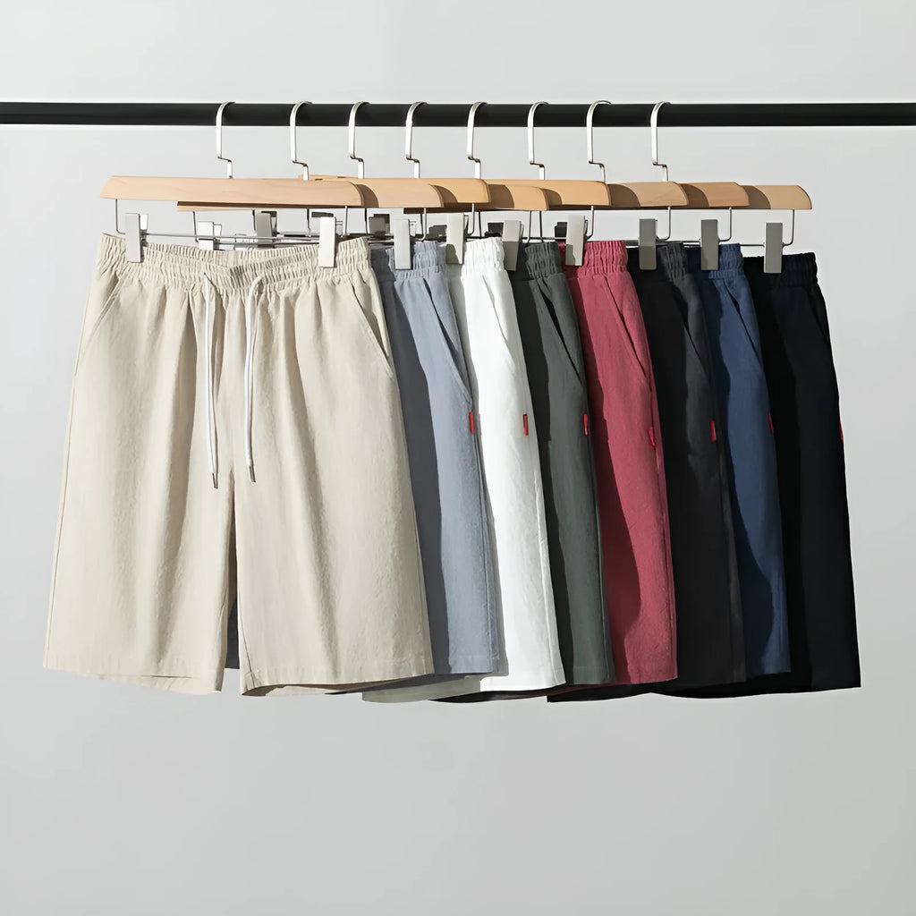 Cotton linen cropped casual pants with drawstring waist in solid Army Green colour on a hanger.