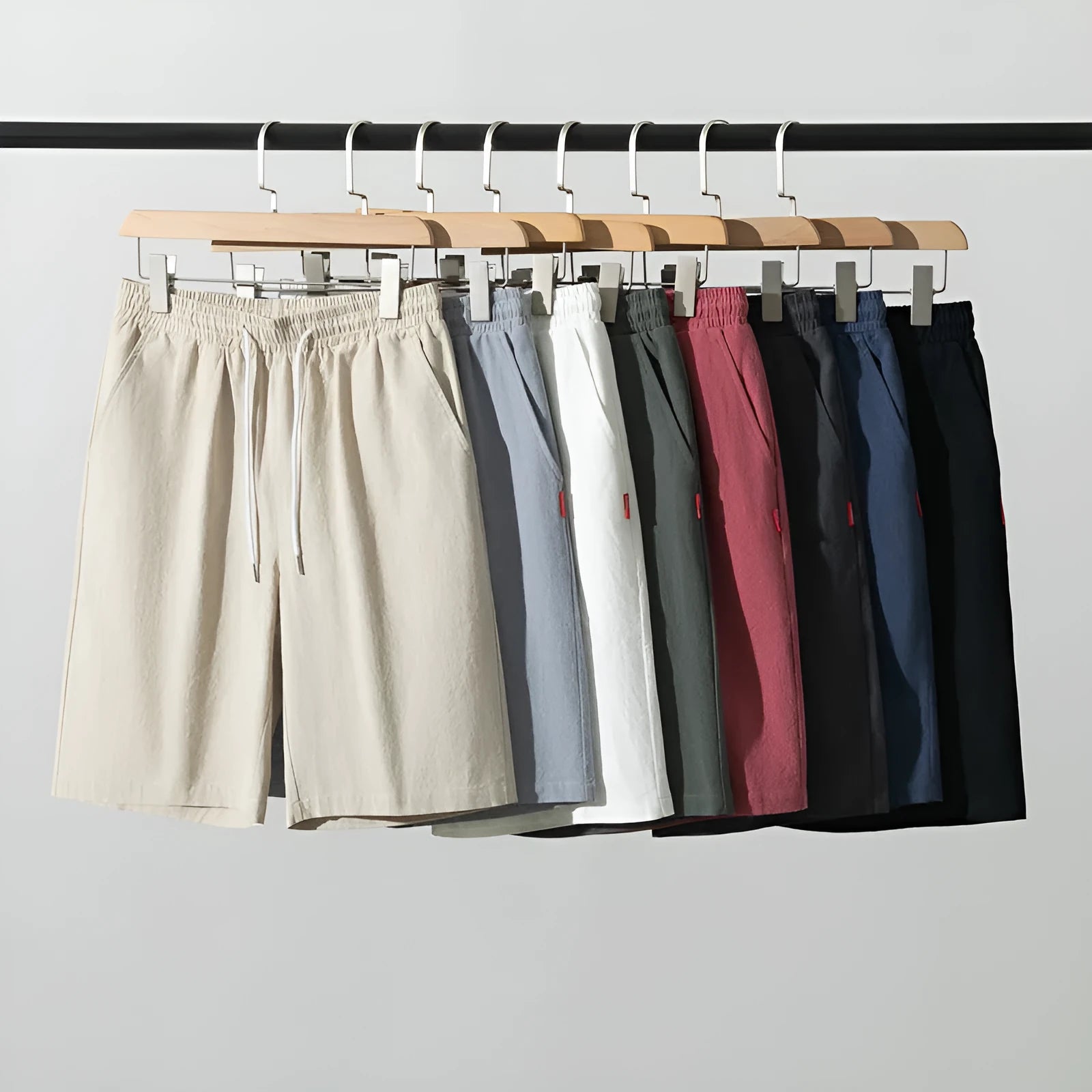 Cotton linen cropped casual pants with drawstring waist in solid Army Green colour on a hanger.