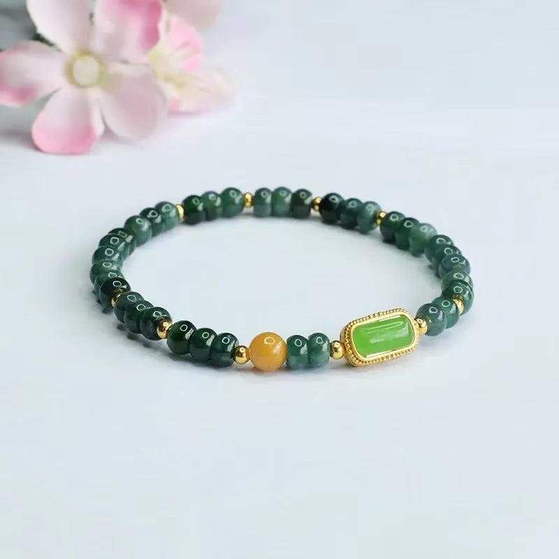 Natural stone blue water jade abacus bead bracelet with geometric design and metal spacers