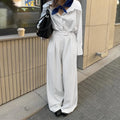 White striped wide-leg women's trousers with front zipper fastening for commuting