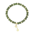 Green Chinese-style bamboo joint bracelet and necklace set made from alloy with Hetian jade accents.