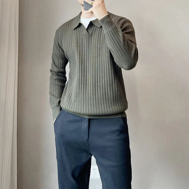 Men's loose grey knitted pullover sweater with a lapel collar on a hanger.