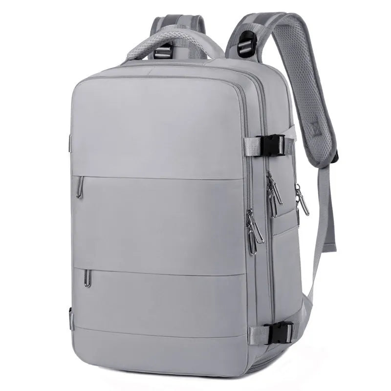 Large purple travel backpack with multiple compartments and an air pillow belt, shown open to display interior organisation.