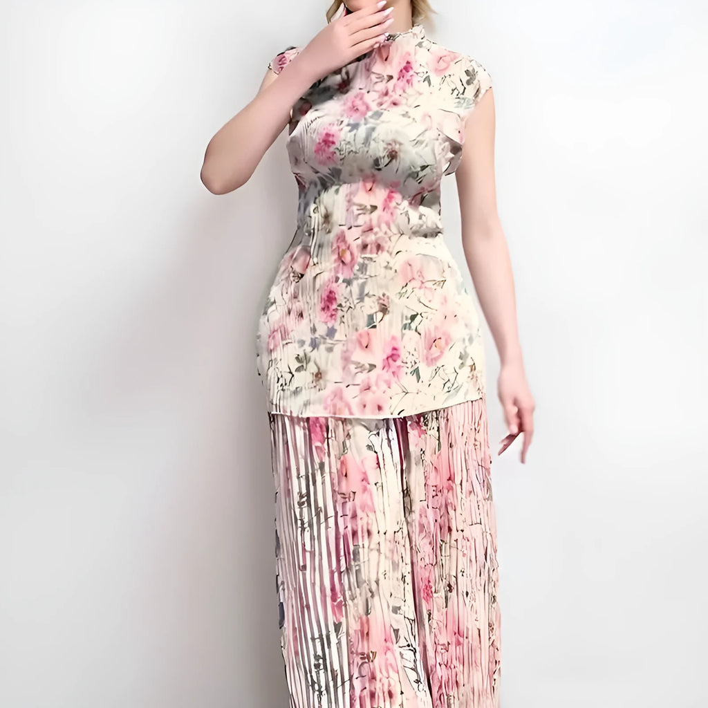 Women's long sleeve printed chiffon top paired with a high waist matching skirt.