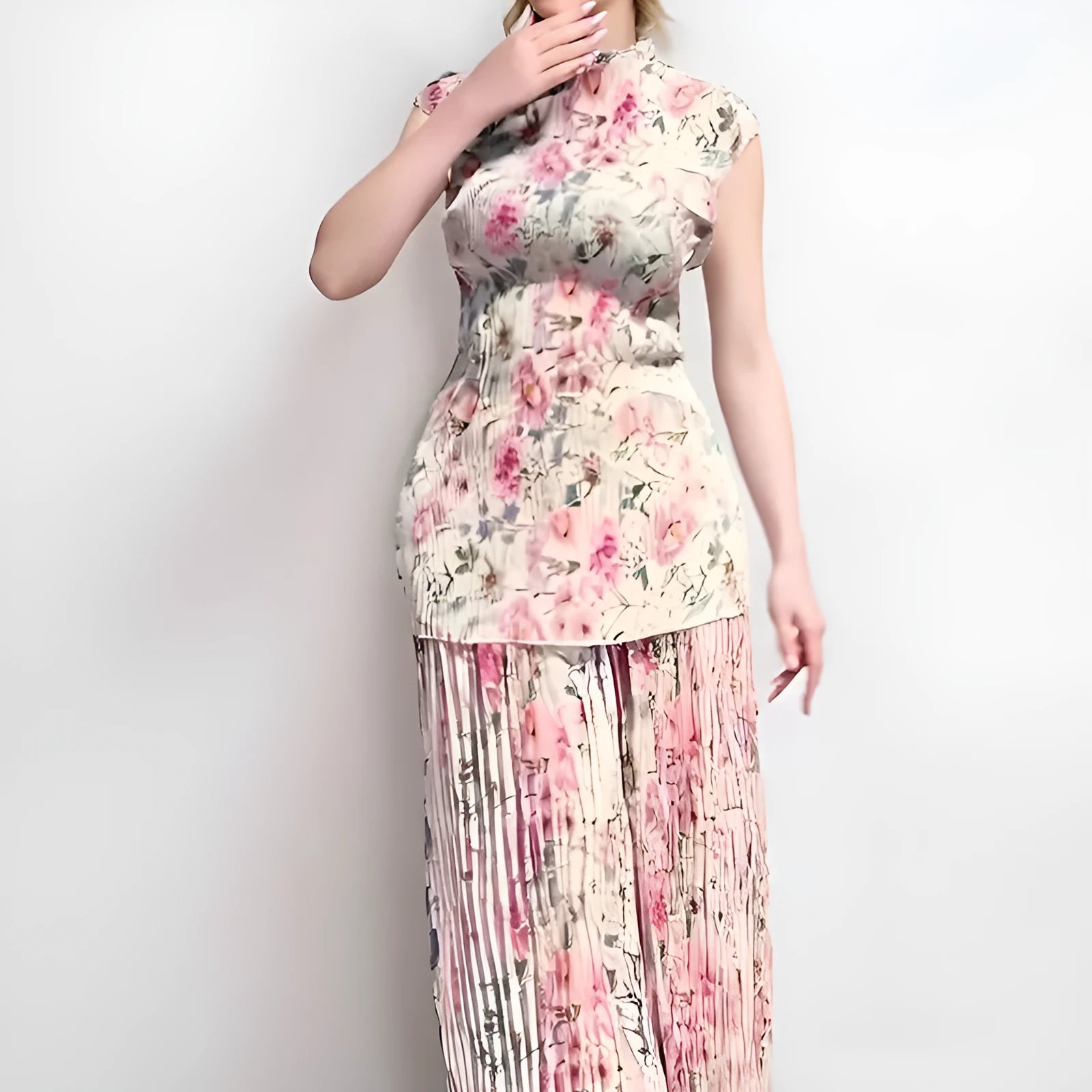 Women's long sleeve printed chiffon top paired with a high waist matching skirt.