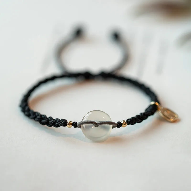 Women's crystal bracelet with vintage weaving and flower-shaped chamfered crystals on rope strap