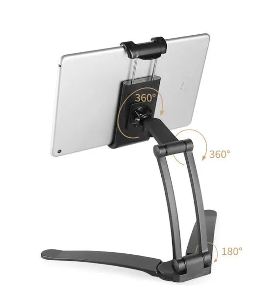 Silver aluminium alloy desktop tablet stand holding a tablet, showing 360-degree adjustable arm and mounting base.