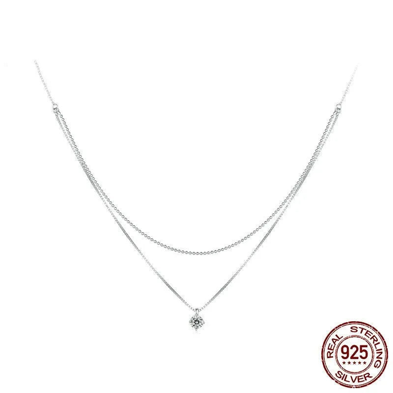 S925 sterling silver double layer necklace with pearl chain and silver alloy pendant.