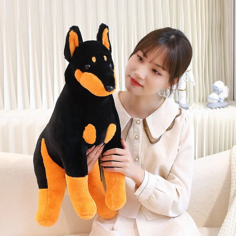 Black Doberman Pinscher plush toy with short plush surface, available in 40cm or 55cm sizes