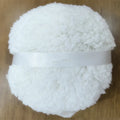 Oversized rectangular plush powder puff measuring 150x75mm in white colour variant