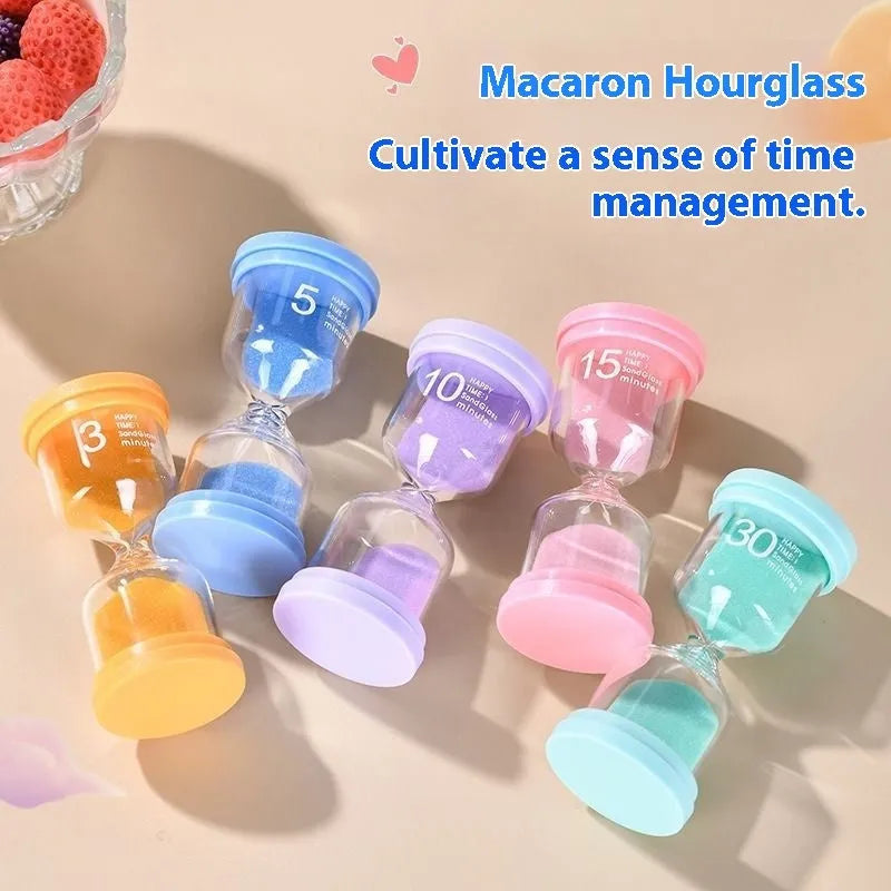 Glass sand clock timer showing coloured sand flow with blue, green, pink, and purple colour options