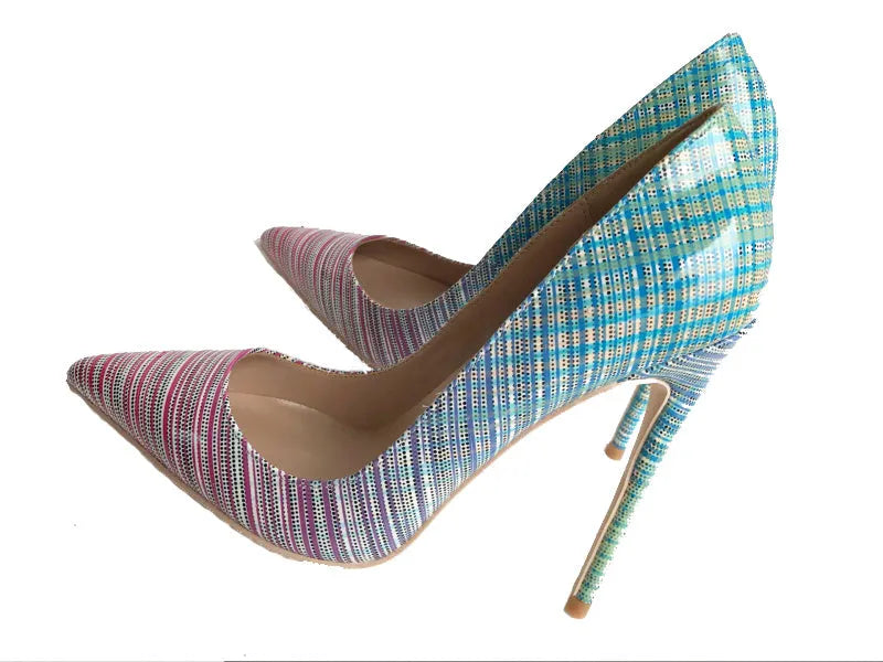 A pair of women's pink and blue gradient patent leather high heel shoes with a pointed toe.