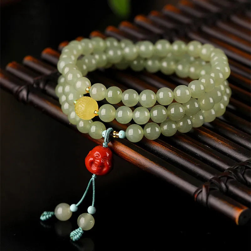 Pale blue Hetian Jade bracelet with 6mm beads in three circle female design