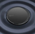 Black Kuulaa wireless disc phone charger with Micro USB cable