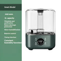 Green large capacity intelligent humidifier with touch screen display and remote control on a table.