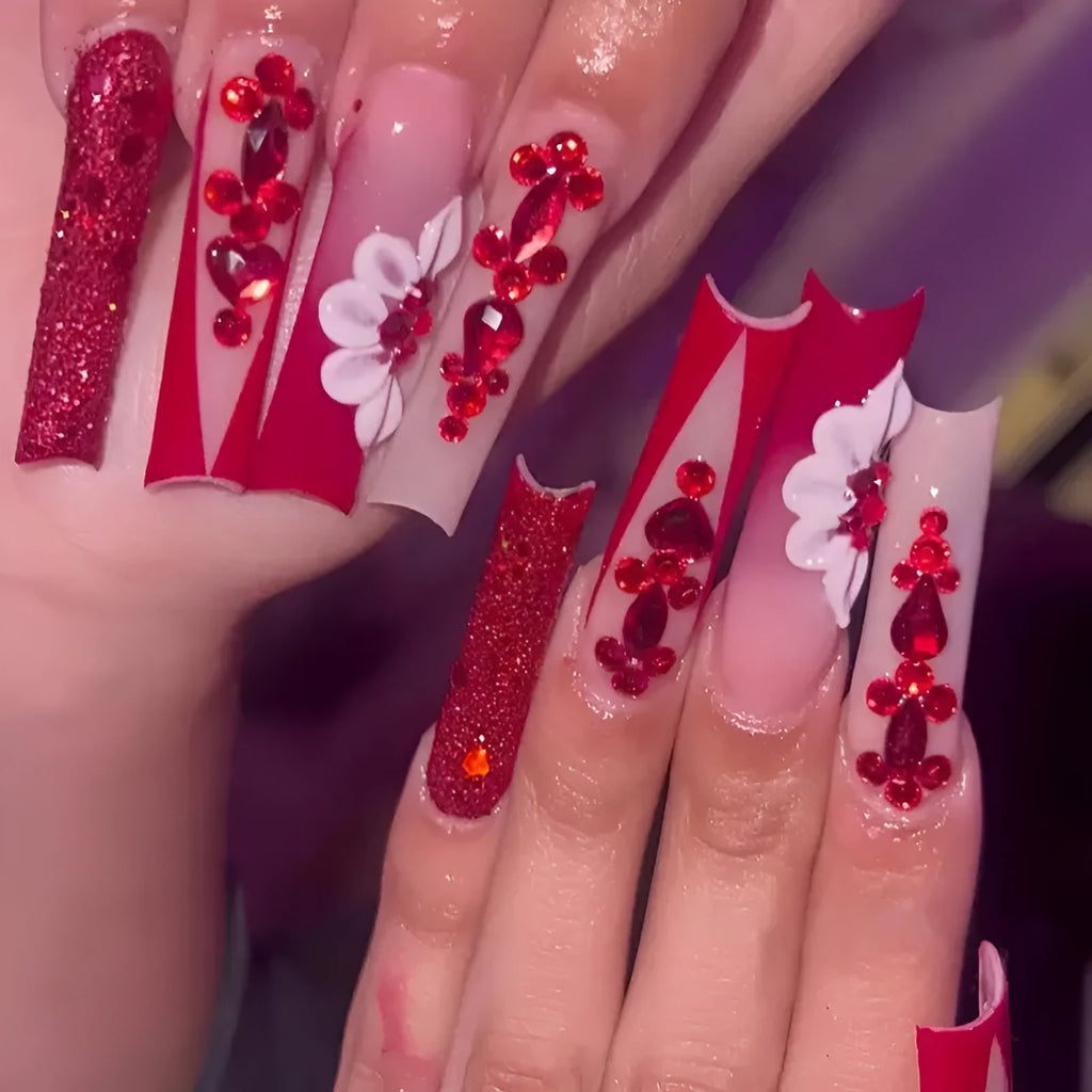 Sweet Flowers Temperament patterned press-on false nails with red diamond accents in a long square shape.