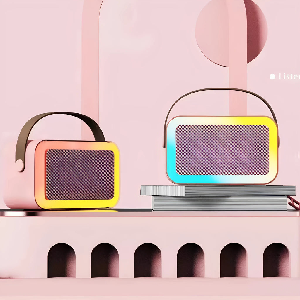 Portable Bluetooth karaoke speaker with microphone in pink, white, or sky blue colour.