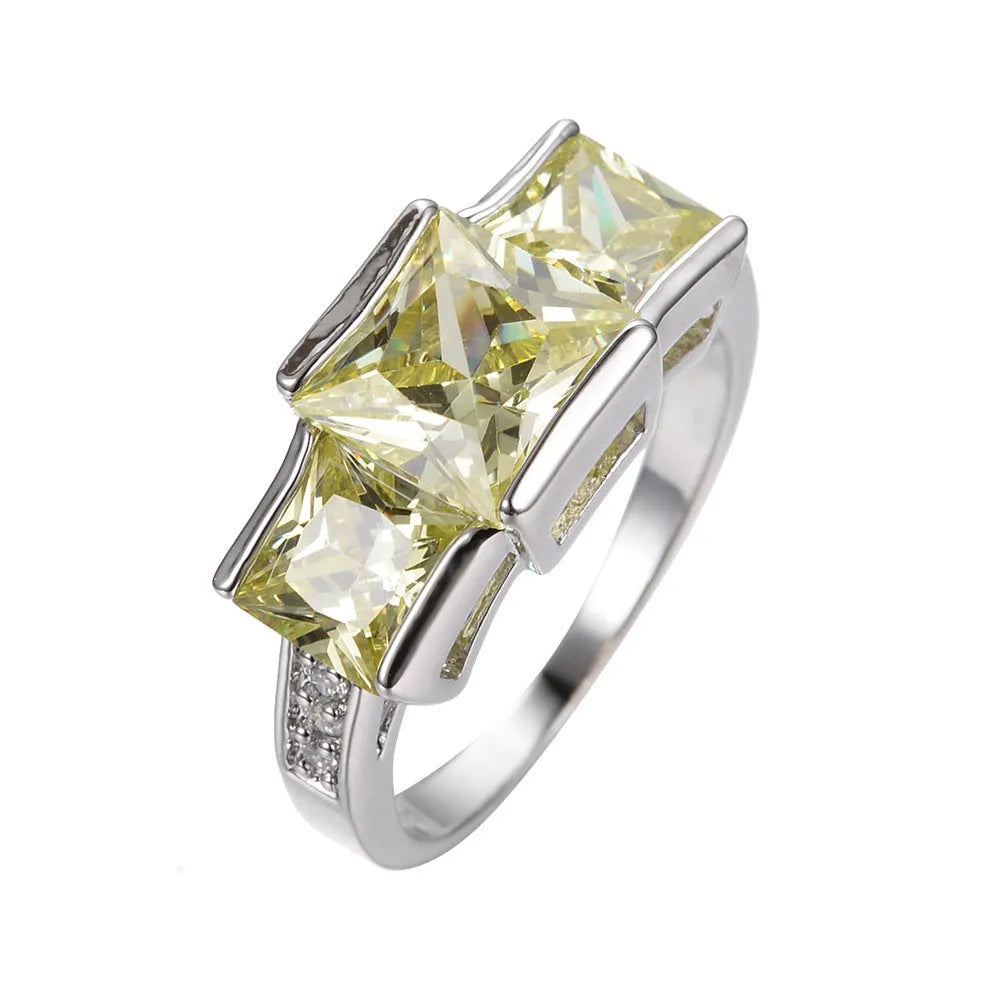 A colourful electroplated copper women's ring with a geometric design, shown in multiple colour options.