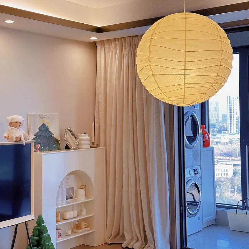 Japanese rice paper chandelier in living room setting showing soft ambient lighting