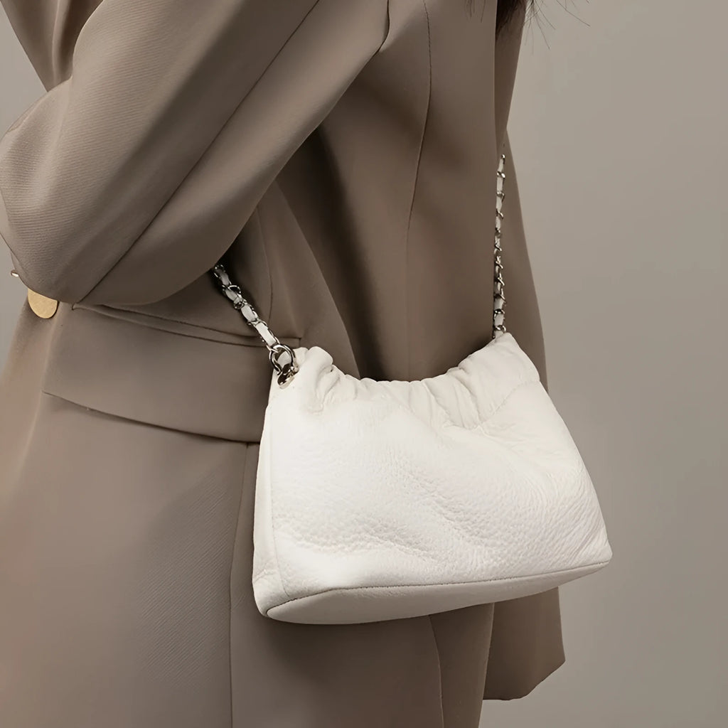 Women's soft leather dumpling-shaped crossbody bag in grey with a single strap