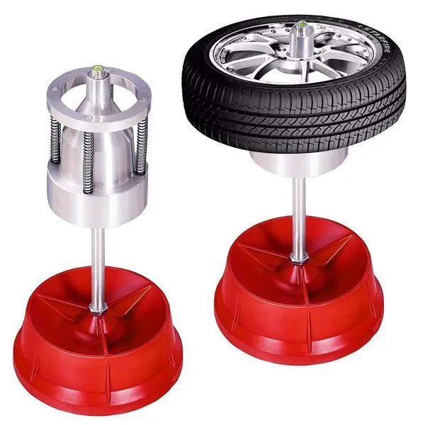 Portable hub balancer with aluminium head for car wheels showing bull's eye level and enamel-finished base