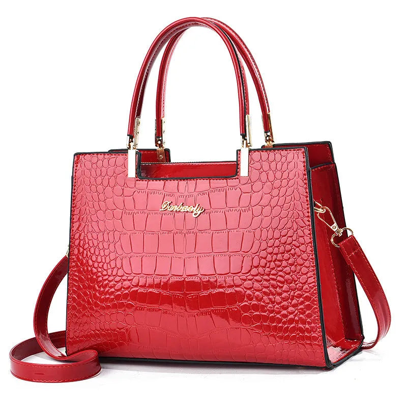 A structured horizontal square one-shoulder handbag in PU leather, shown in a choice of ten colours.