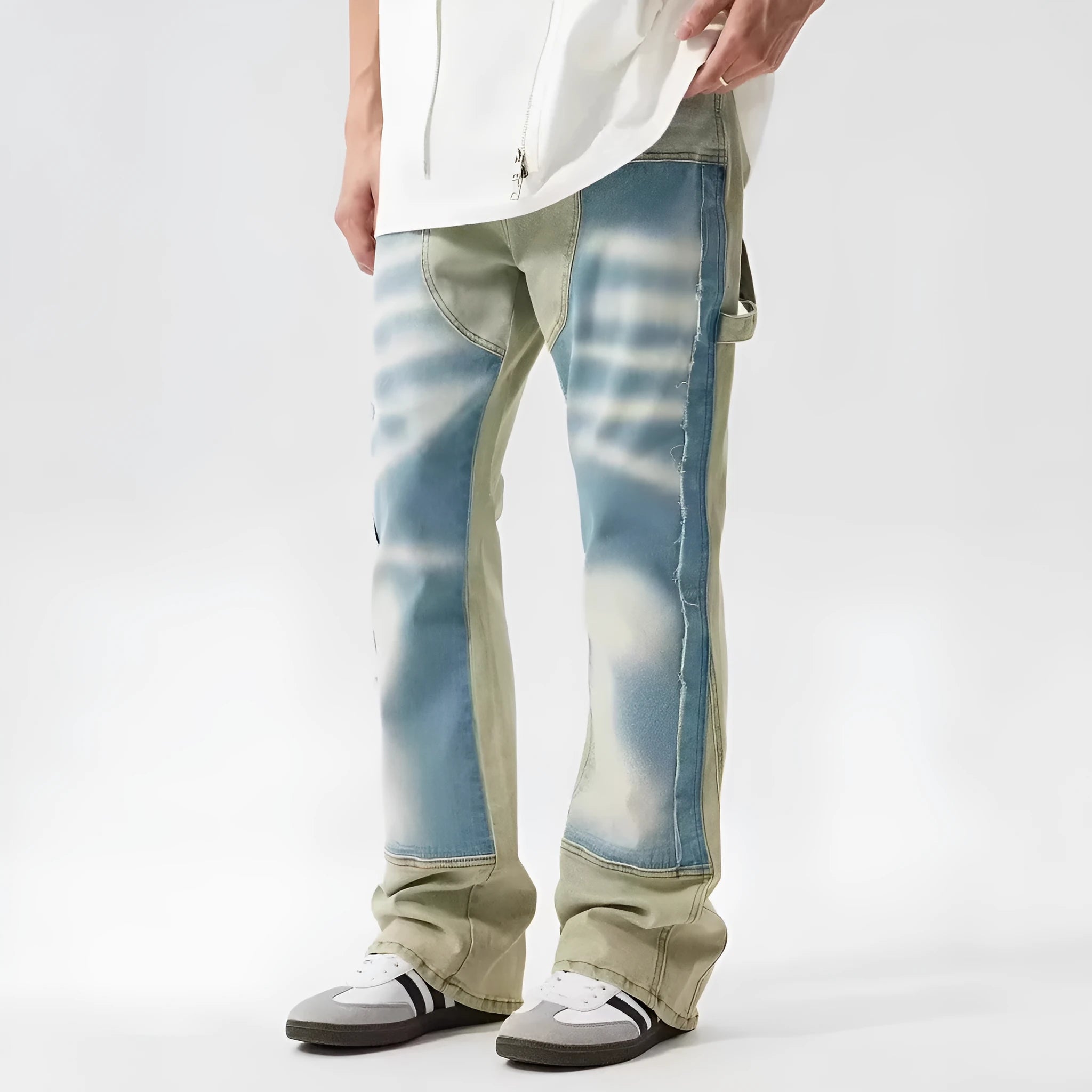 Yellow and blue retro patchwork splash-ink distressed design jeans on a mid-waist.