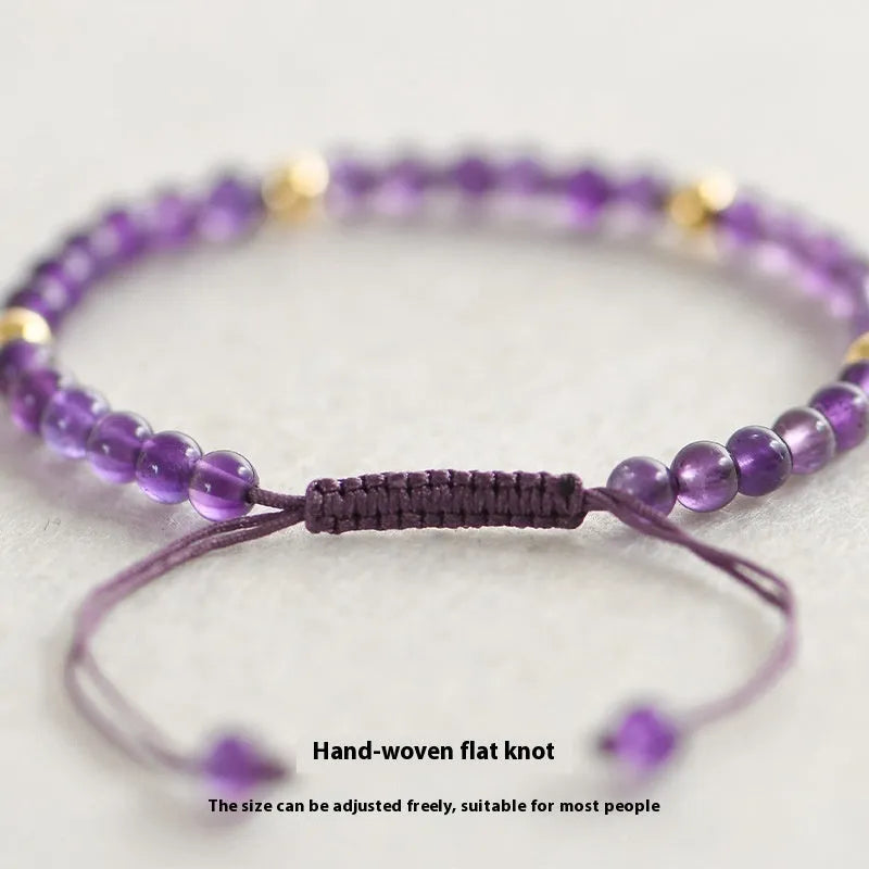 Handmade purple amethyst bracelet with 4mm stones and 14K gold clasp on wrist