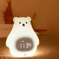 Big White Bear shaped silicone night light with colourful light display on a table