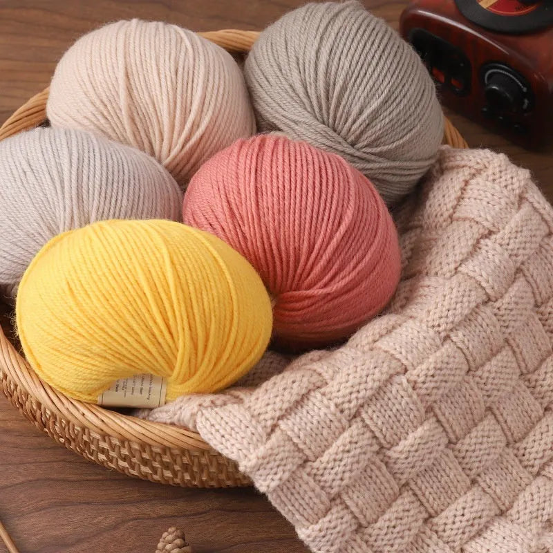 Skein of wool knitting yarn in a chosen colour for 10-needle hand projects.