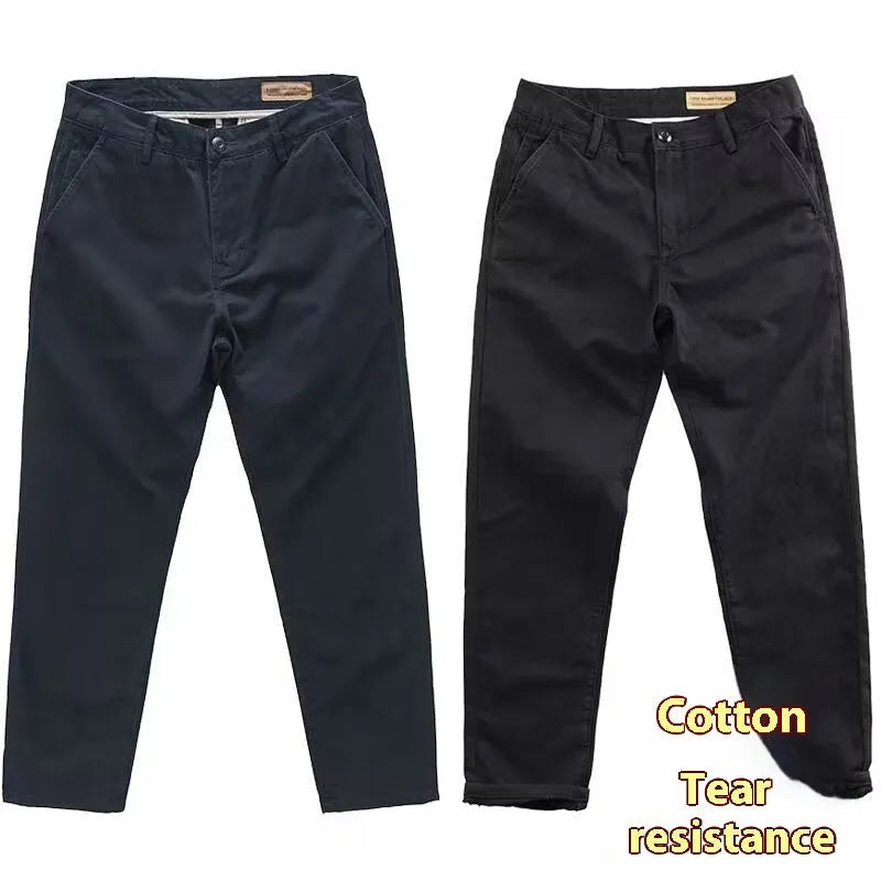 Man wearing slim-fit light straight-leg trousers in a micro-elastic washed fabric