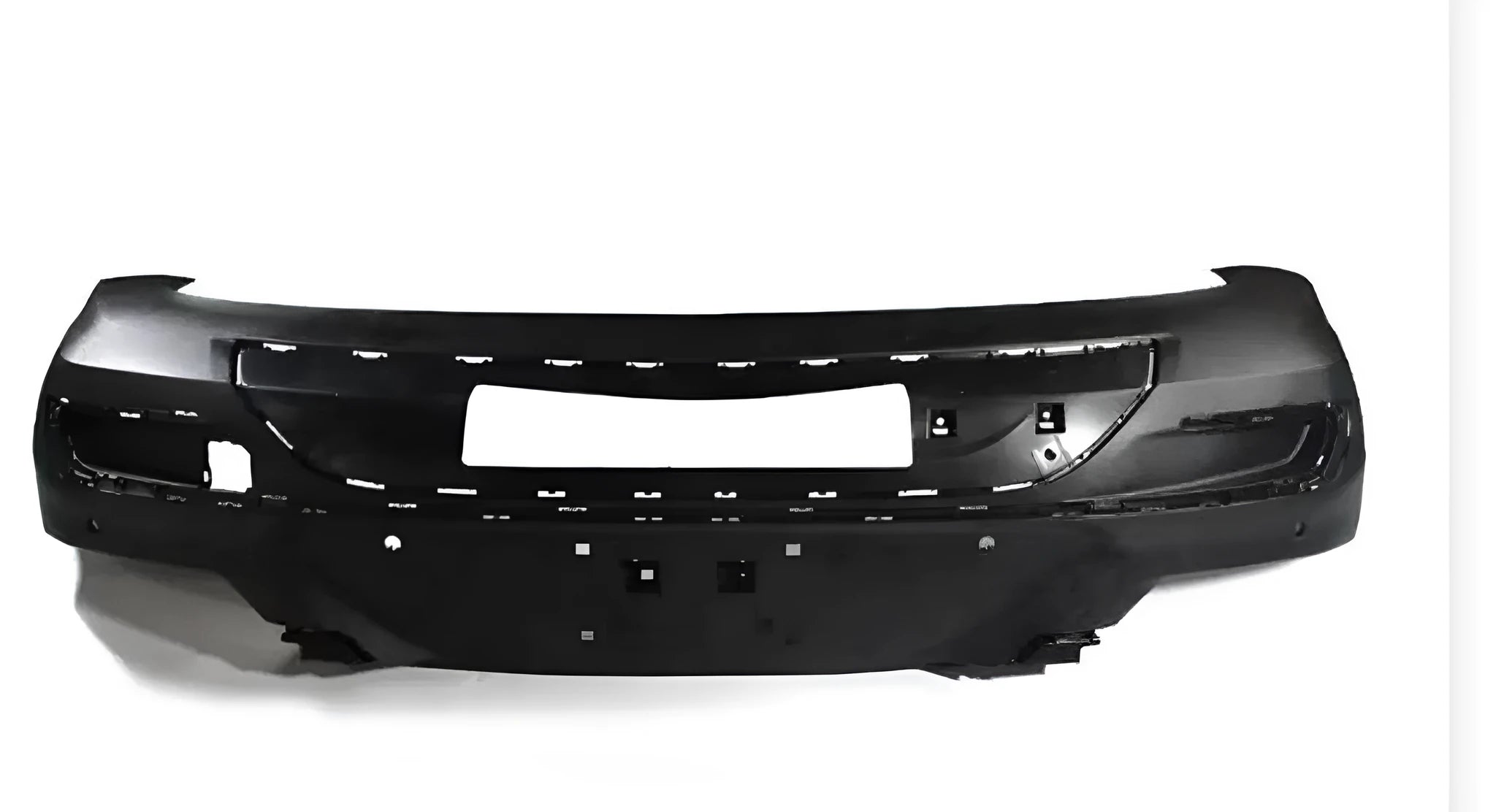Black plastic car bumper repair strip with self-adhesive backing on a white background.