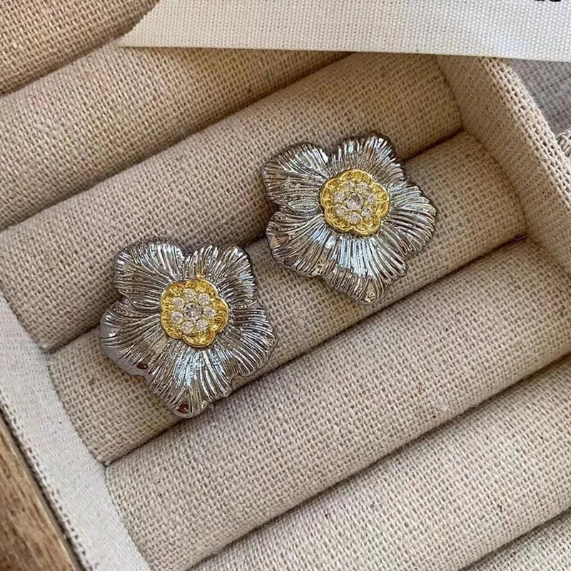 Retro textured gardenia stud earrings with two-tone electroplated finish on copper