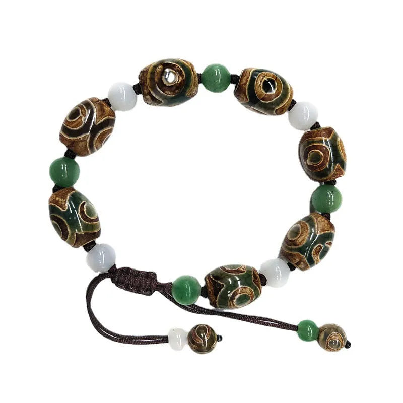 Green agate ethnic bracelet with hand-woven Tibetan beads and geometric patterns