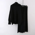 Women's casual two-piece set featuring a long-sleeve sweater and wide-leg trousers in a solid colour.