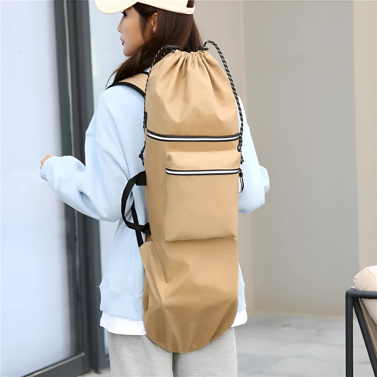 Lightweight nylon skateboard bag in camouflage colour with a large main compartment.