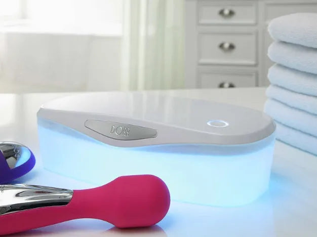 DORR portable UV sterilisation box with USB cable on a white background.