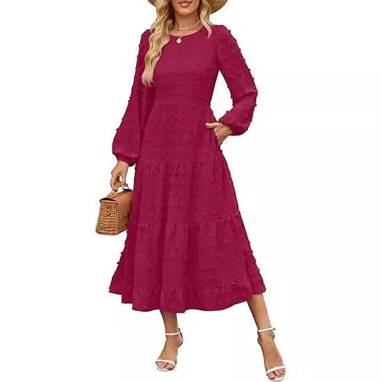 Beige long sleeve casual dress with ruffled sleeves and a high waist on a hanger.
