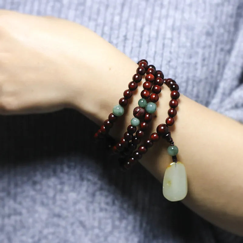 Rosewood bead bracelet with carved Hotian Jade pendant in national style design
