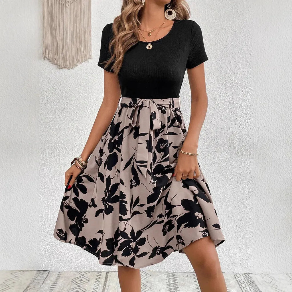 Khaki casual printed women's dress with A-line skirt, shoulder straps, and front lace-up detail.