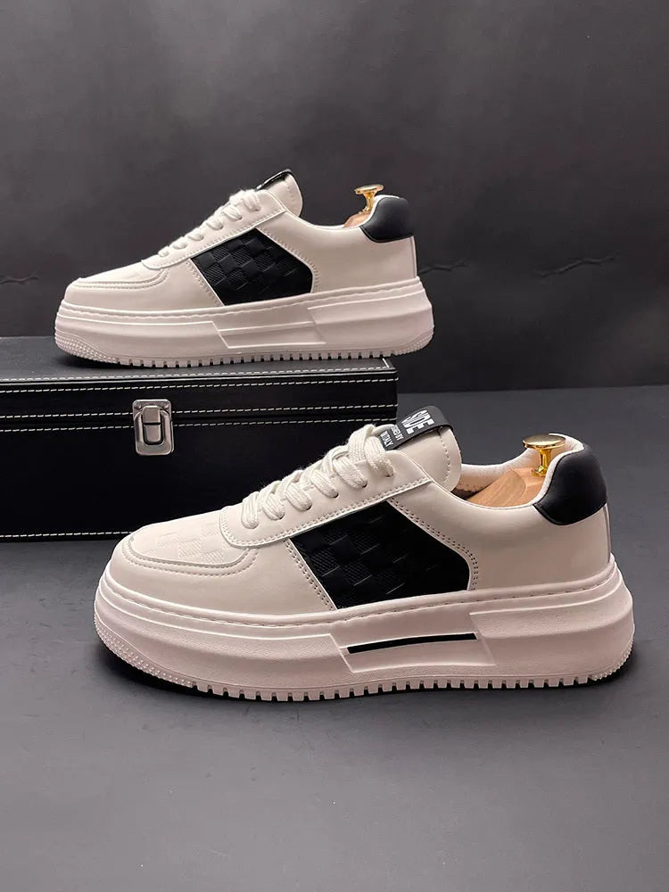 White leisure shoes with green or black detailing, cloth upper and rubber foam sole