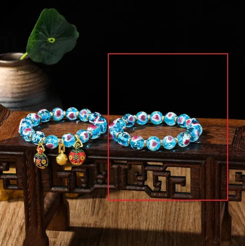 Handmade fluorescent glaze bracelet with swallowing gold beast motif on heart-shaped 10mm beads