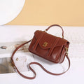 Full-grain vegetable-tanned cowhide tote bag in horizontal rectangular shape with double shoulder straps, large capacity interior, available in five colours