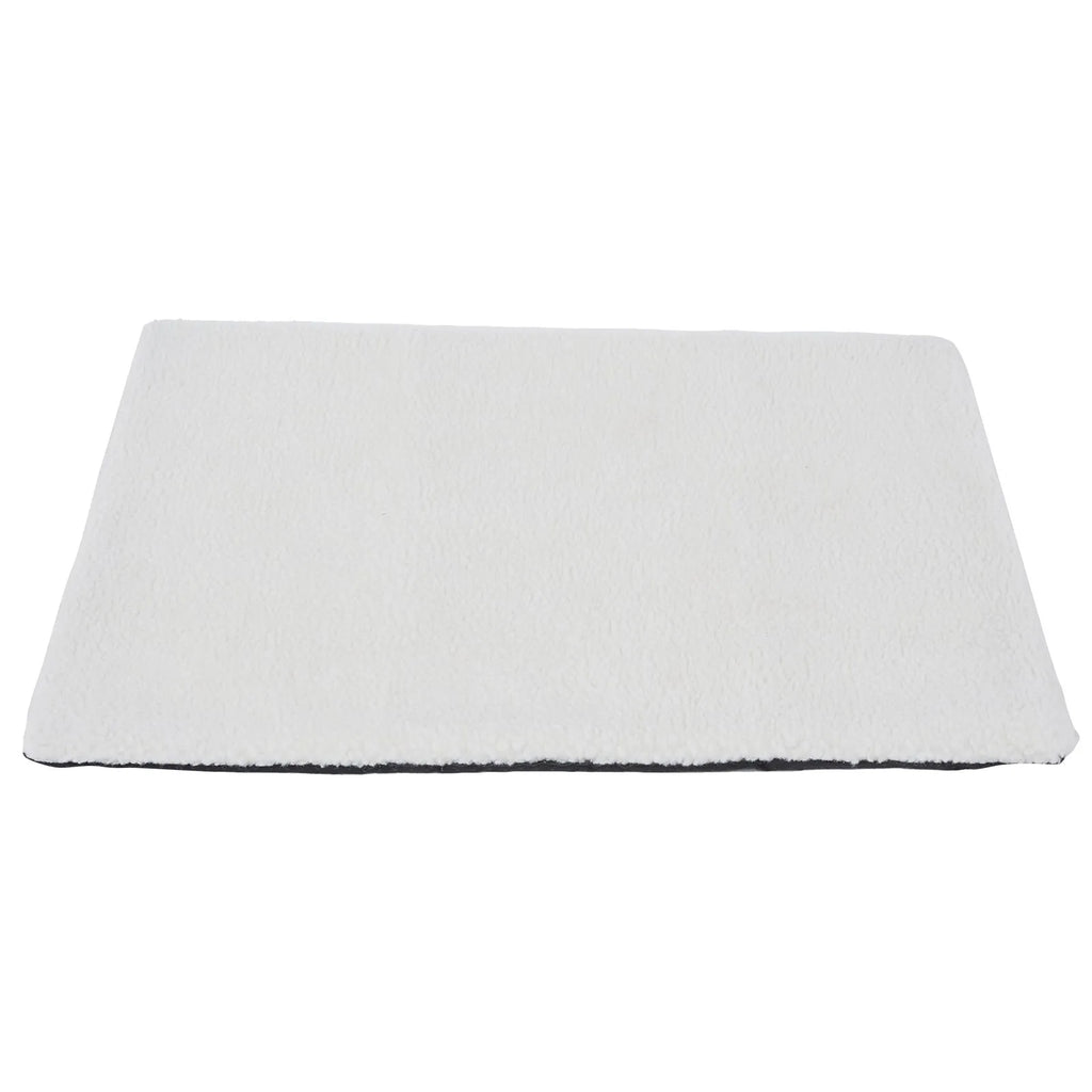 Grey self-heating plush pet pad for cats and dogs on a wooden floor.
