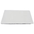 Grey self-heating plush pet pad for cats and dogs on a wooden floor.