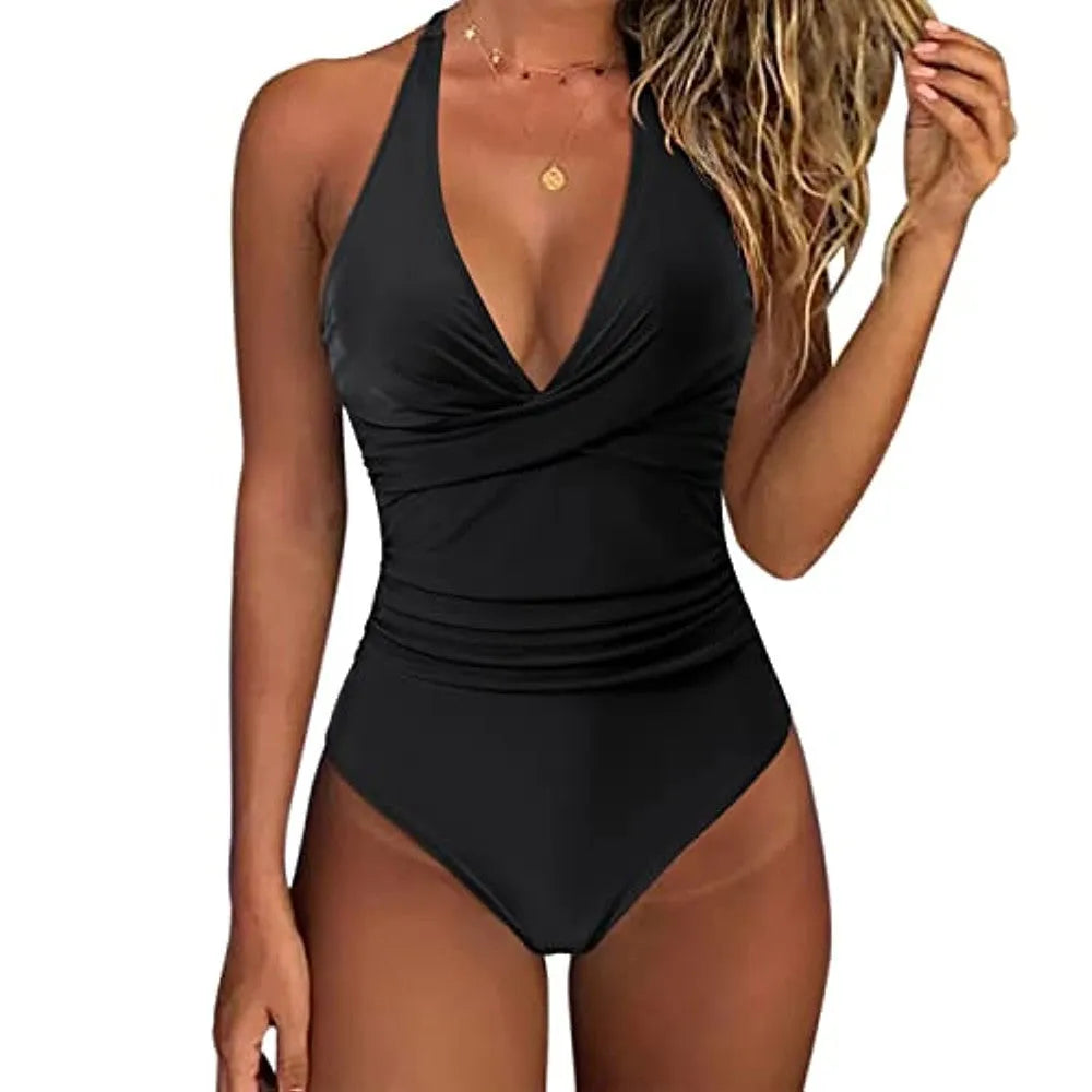 Women's solid colour cross-front one-piece swimsuit in bikini style on a hanger