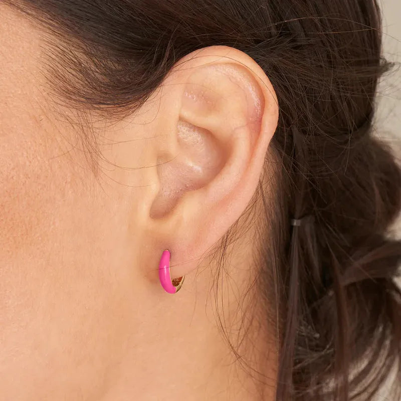 A pair of curved U-shaped oval ring stud earrings with a smooth epoxy resin finish in a selected colour.